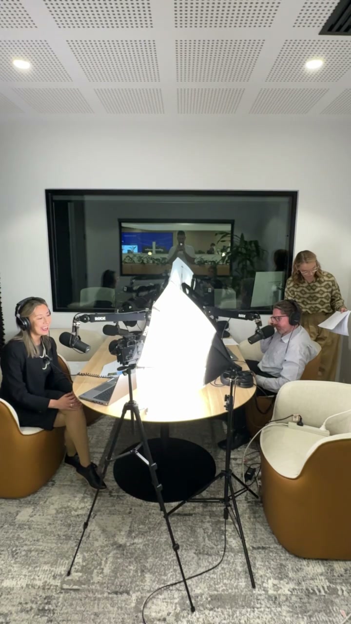 A filmed strategy conversation in an office