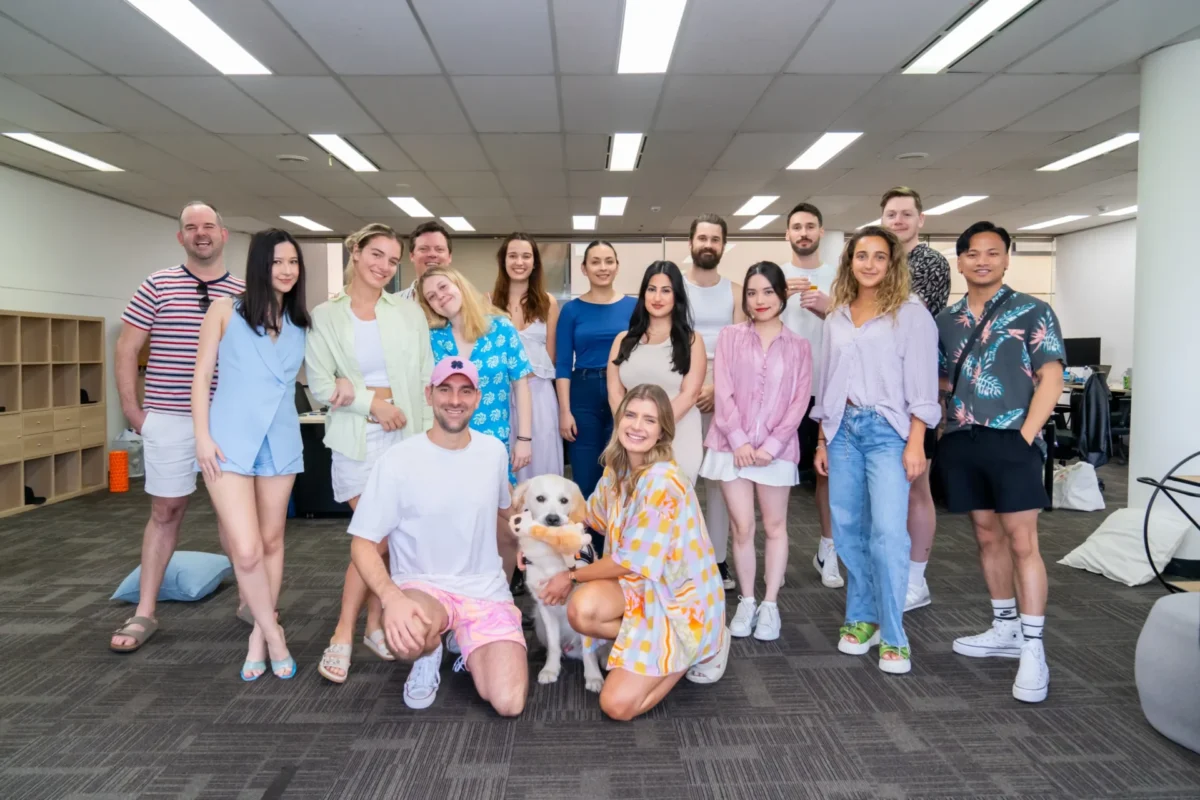 The Social Status team together in their office